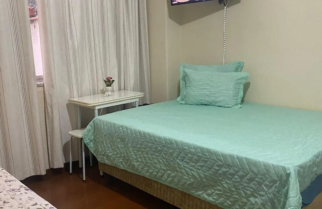 Quarto atrás do Copacabana Palace 3 pessoas-1